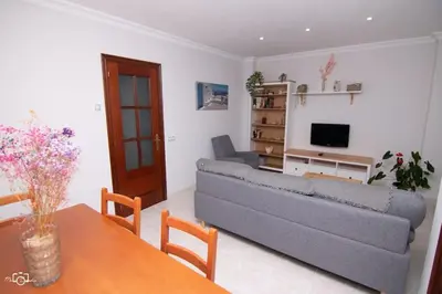 a living room with a couch and a table at CASA Conchita in Ribadeo