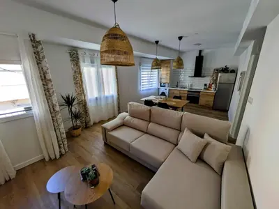 a living room with a couch and a table at Mi Camino in Sarria