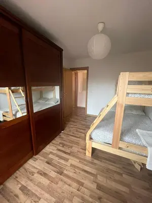 a room with two bunk beds and a closet at EnVIVEIRO Relax Total Playa de Covas in Viveiro