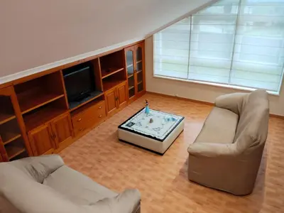 a living room with a couch and a coffee table at Grenxo in Santiago de Compostela