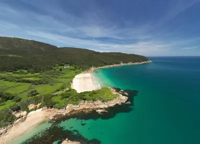 an aerial view of a beach and the ocean at The Cliffs - Casa Catuxa in Viveiro