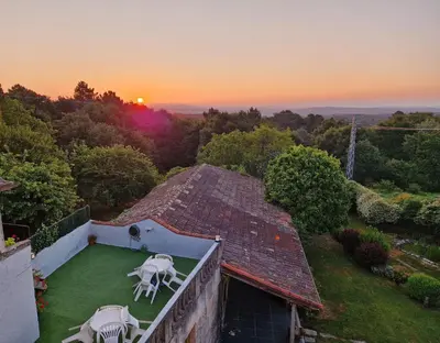 an aerial view of a house with two chairs on a lawn at Casa San Amaro in San Amaro