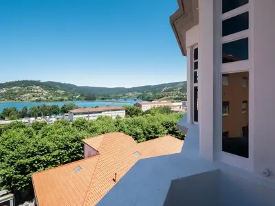 a view from the balcony of a building at La Fantástica Pontedeume 3 in Puentedeume