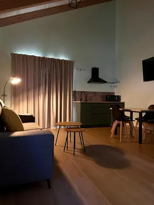 a living room with a couch and a table at Ensueño in Molinaseca