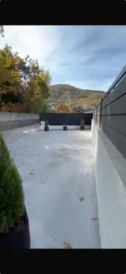 a view of a patio with a bench and a mountain at Ensueño in Molinaseca