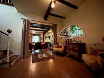 a living room with a couch and a table at As Erdades in Ourense