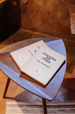 a book sitting on top of a table at Casa do Corral in Hospital
