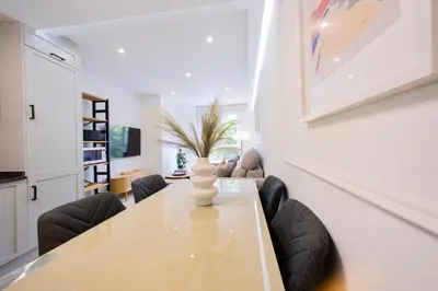 a dining room with a table and chairs at Rosalia Park by Lugo Collection in Lugo