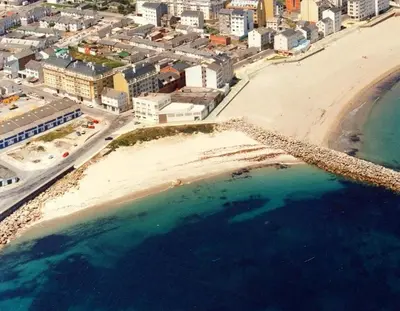 an aerial view of a beach and the ocean at BURELA Mariña PLAYA in Burela de Cabo