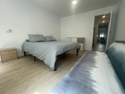a bedroom with two beds in a room at Céntrico apartamento muralla 2 in Lugo