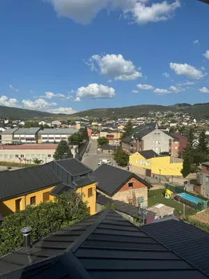 a view of a city from a roof at Hostal Pensión LA TORRE in Fabero
