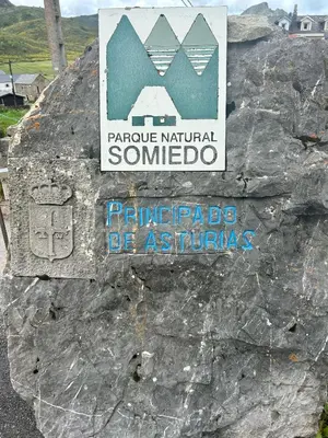 a sign on the side of a rock at Coronel Somiedo by Unusual Hotels in El Puerto de Somiedo