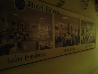 a sign for the hotel piertera on a wall at Hostal Piñera in Vega de Espinareda