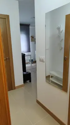 a mirror on a wall in a room at LAR de Yago - Habitación Ribadeo in Ribadeo