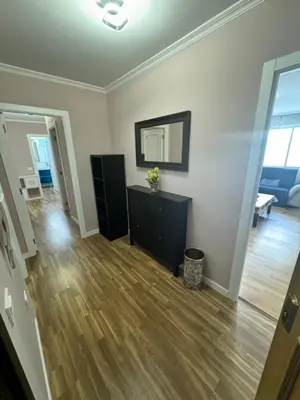 a living room with a dresser and a mirror at Serendipia in Villalba