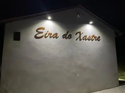 a sign that says emma do karate on a wall at Eira do Xastre in Brocos