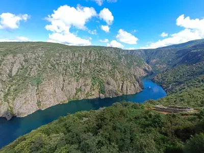 an aerial view of a lake in the mountains at Luz do Sil in Ourense