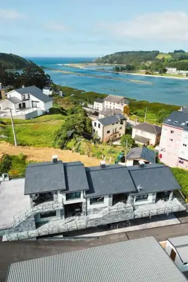 an aerial view of a house and the ocean at El Cañon By Silastur in El Espín