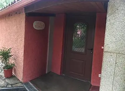 a front door of a house with a sign on it at Casa Romeo in Brion