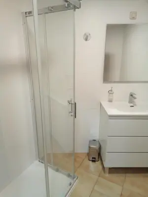 a bathroom with a shower and a sink at Pensión La Plaza in Betanzos