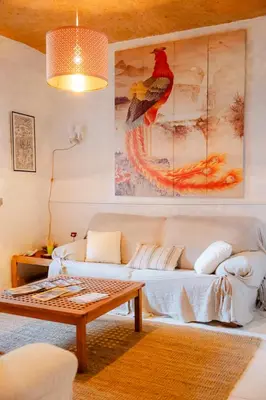 a living room with a couch and a coffee table at Arzipreste I Casa del Cura in León