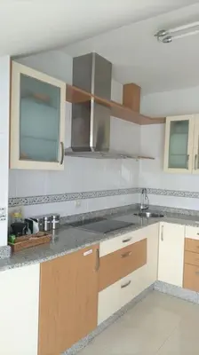 a kitchen with a sink and a counter top at La Tebaida in Ponferrada