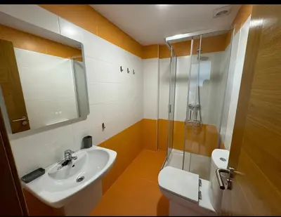 a bathroom with a sink and a shower at Apartamento Playa las catedrales in Foro