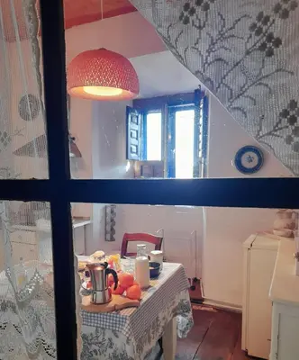 a kitchen with a table with food on it at Arzipreste II Casa del Ama in León