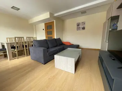 a living room with a couch and a table at YourHouse Maca I in Ourense