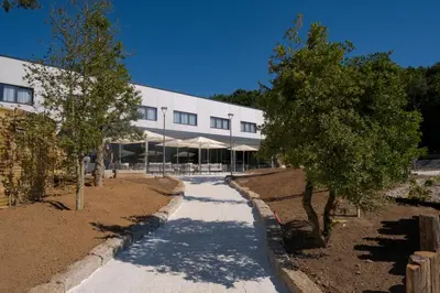 a walkway in front of a building at La Finca in Lugo