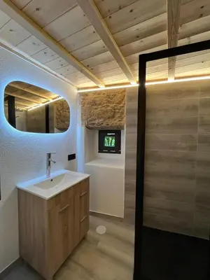 a bathroom with a sink and a mirror at Bella Casa Araujo in Lamas