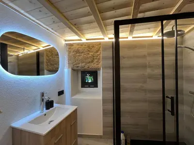 a bathroom with a sink and a shower at Bella Casa Araujo in Lamas