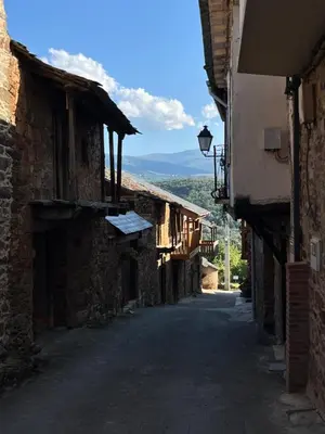 an empty street in an old stone building at La Casina de Gelo in Riego de Ambros