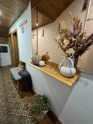 a room with a counter with vases on it at Casa Pataco in Cangas del Narcea