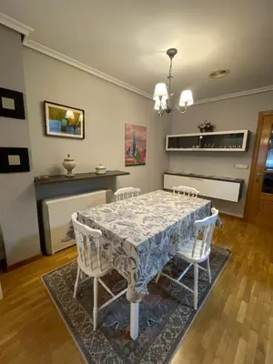 a dining room with a table and chairs at Bierzo Explore in Ponferrada