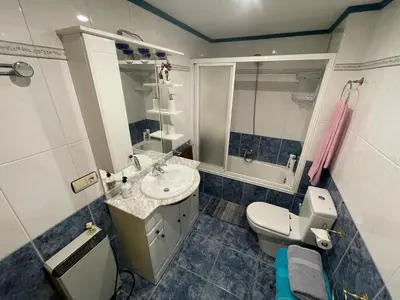 a bathroom with a toilet and a sink at Bierzo Explore in Ponferrada