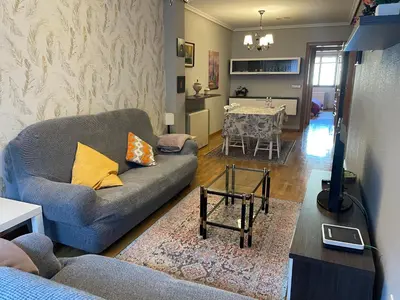 a living room with a couch and a table at Bierzo Explore in Ponferrada
