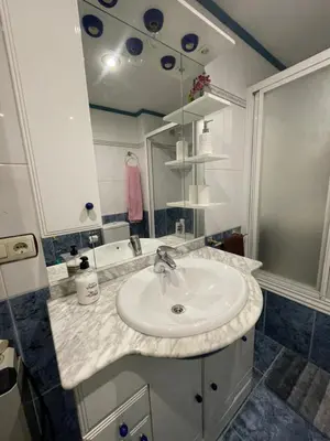 a bathroom with a sink and a mirror at Bierzo Explore in Ponferrada