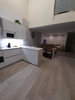 a bedroom with a bed and a white closet at La Herencia A VuT 1229 in Ponferrada