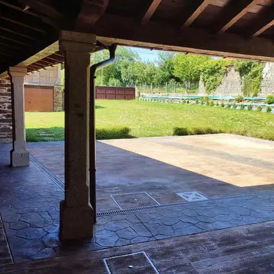 a pavilion with a view of a park at O Lar da Crega in O Pino