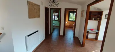 a hallway of a home with a tile floor at As Lamelas in Cea