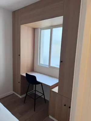 a small room with a desk and a window at Kilometro 22 Luxury in Padrón