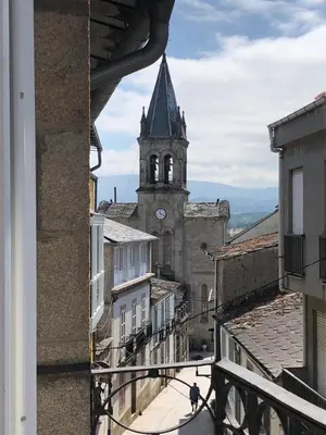 a view of a building with a clock tower at Estudios rúa Maior, 49-2A in Sarria