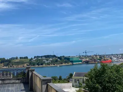 a view of a river from a balcony at Apartamentos Buenos Aires,en el centro de Ribadeo con vistas a la ría in Ribadeo