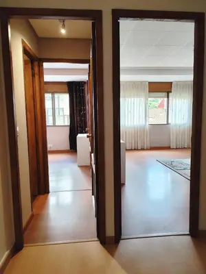 an open door into a room with a hallway at Piso de Alba in Chantada