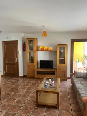 a living room with a couch and a coffee table at A Xanuca in Taramundi