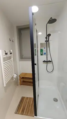 a bathroom with a shower with a glass door at Orballo in Ourense