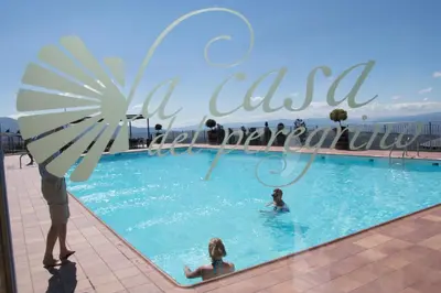 a group of people in a swimming pool on a cruise ship at Hotel Albergue La Casa Del Peregrino in El Acebo de San Miguel