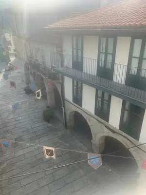 an overhead view of a building with kites on a string at A Casa do Sastre1 in Ribadavia