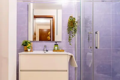 a bathroom with a sink and a shower at Apartamento de playa in San Ciprián